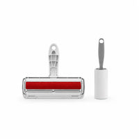 Shopify pet hair roller with handle and sticky sheets for removing pet hair and lint from furniture and clothing.