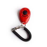 Shopify dog training clicker with wrist strap, handheld device for effective obedience training and positive reinforcement.