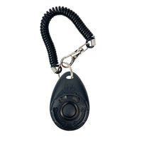 Shopify dog training clicker with wrist strap showing a small handheld device used for training pets.