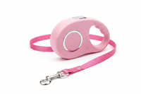 Pink retractable dog leash, 5-meter length, Shopify accessories, with handle and adjustable cord for walking dogs.