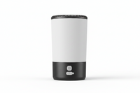 Shopify portable pet paw cleaner cup in black and white with soft brushes for cleaning pet paws effectively.