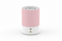Pink and white portable pet paw cleaner cup from Shopify, designed for easy cleaning and hygiene of pet paws.