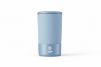 Shopify portable pet paw cleaner cup with blue handle, designed for cleaning and hygiene of pets' paws.